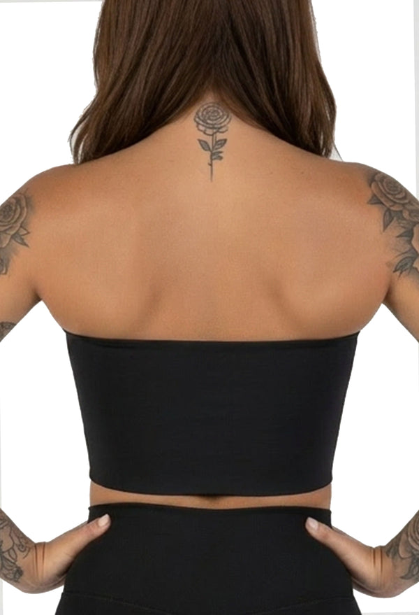 Model wearing compression chest binder with natural movement and all-day comfort support